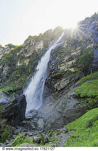 Scenic view of Foroglio waterfall flowing from mountain