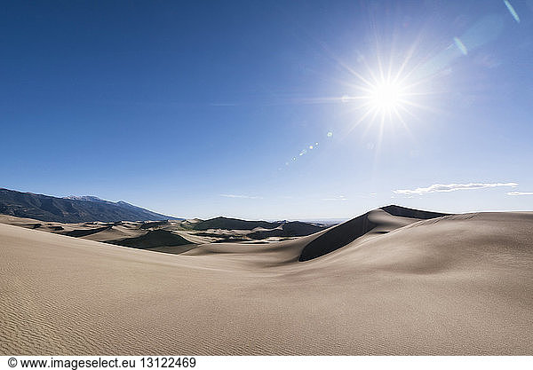 Scenic view of great sand dunes national park on sunny day