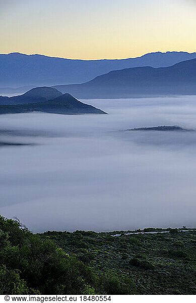 Scenic view of Langeberg mountains with fog