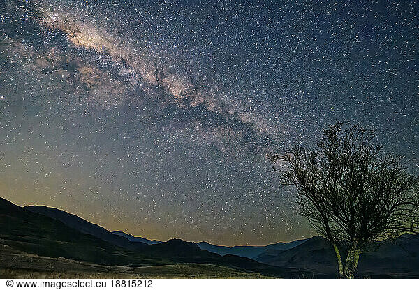 Scenic view of milky way above mountain range at night