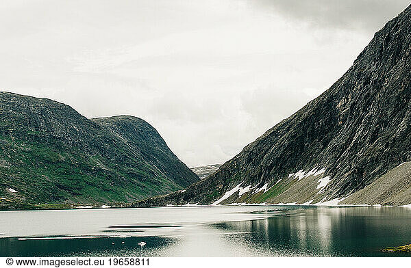 scenic view of mountains and lake in Norway