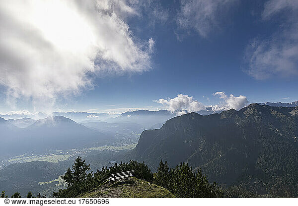 Scenic view of mountains under cloudy sky