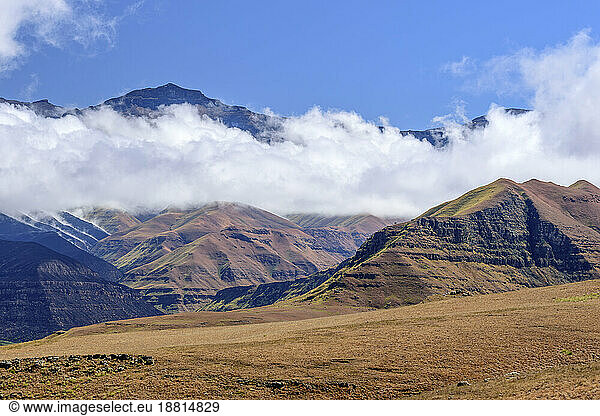 Scenic view of mountains with cloudy sky  Maloti-Drakensberg Park  South Africa