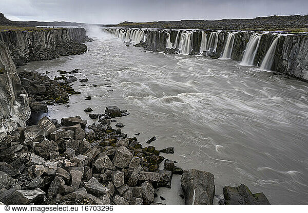 Scenic view of Selfoss waterfall on Jokulsa a Fjollum river against sky Northern Iceland