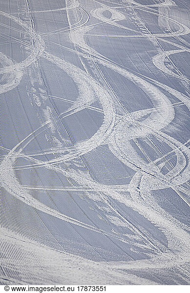 Scenic view of ski tracks on snow
