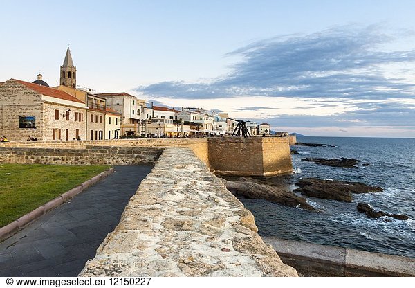 Scenic view of waterfront and an romantic sky during sunset. Alghero  Sardinia. Italy.