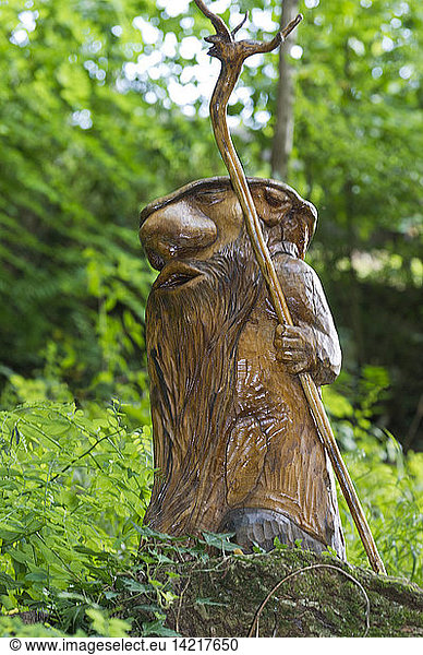 Sculptures and gnomes in the wood  Paladina  Lombardy  Italy