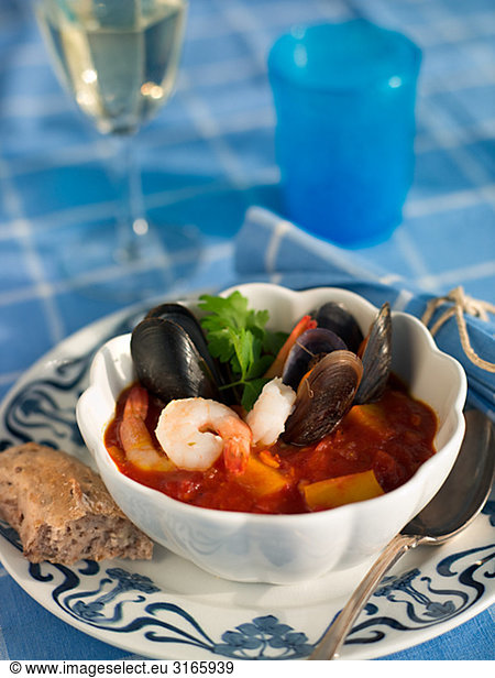 Seafood stew with bread and a glass of wine  Sweden.
