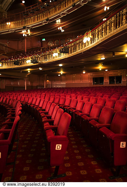 Seats in empty theater auditorium