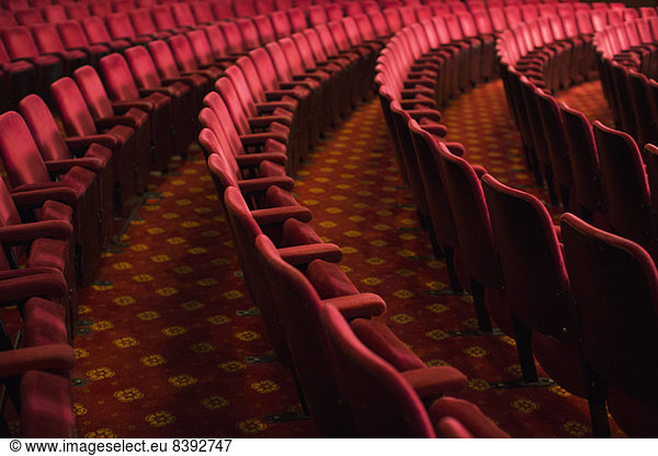 Seats in empty theater auditorium