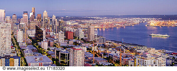 Seattle cityscape and coastline at dusk