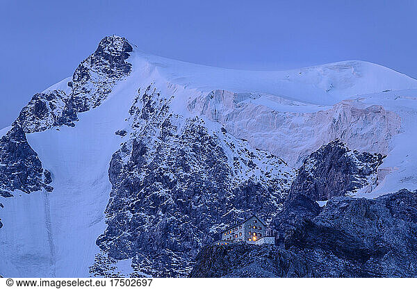 Secluded Payerhutte refuge in Ortler Alps at dusk