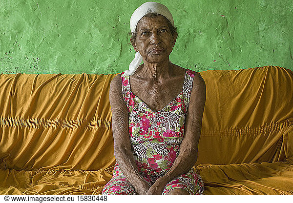 Senior Afro-Brazilian woman from north Minas Gerais  at home