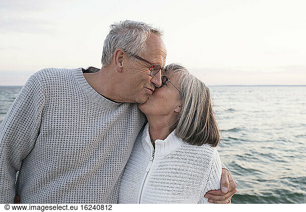 Senior couple kissing