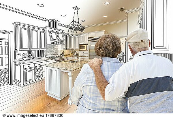 Senior couple looking over custom kitchen design drawing and photo combination