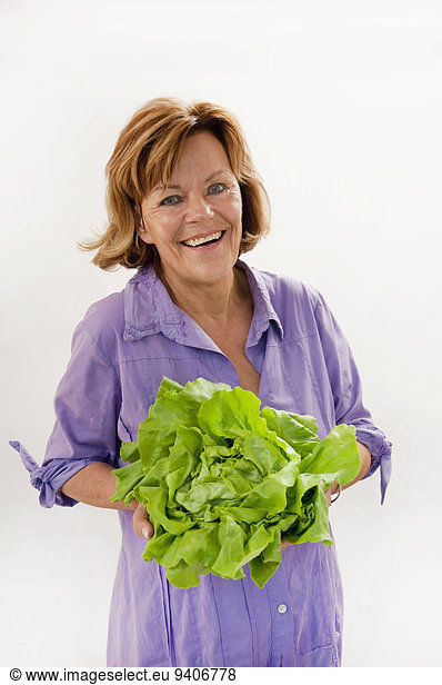 Senior Senioren Portrait Frau lächeln Salat