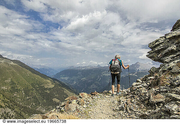 Senior woman hiking  Haute Route  Valais Canton  Switzerland