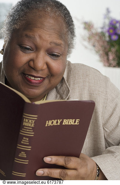 Senior Woman reading the Bible