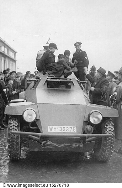 SG hist.  Nationalsozialismus  Organisation  Winterhilfswerk (WHW)  Spendenaktion mit Hilfe der Wehrmacht  Kinder dÃ¼rfen auf einem Panzerfunkwagen mitfahren  Deutschland  1940 / 1941