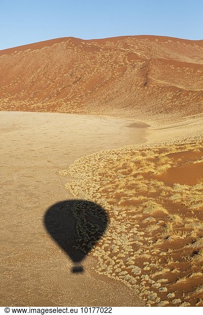 Shadow of a hot-air balloon in the Namib Desert  photographed from the basket of the balloon  Namib-Naukluft National Park  Namibia  Africa