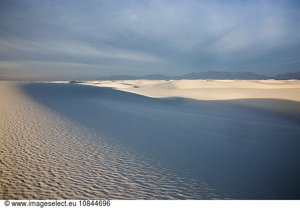 Shadows over tranquil white sand dune  White Sands  New Mexico  United States