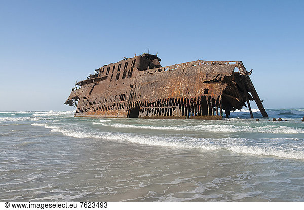 Shipwreck stranded on beach