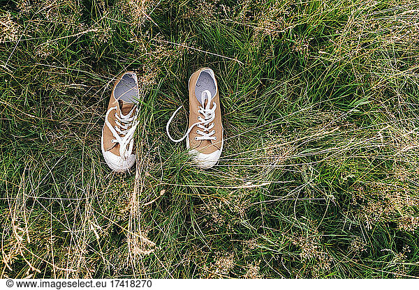 Shoes on grass at park