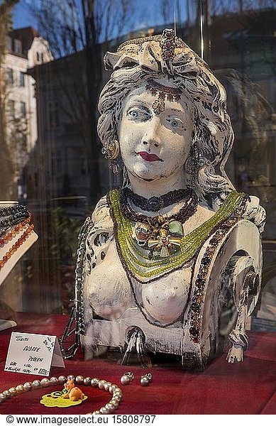 Shop window with decorated bust  shop for precious metal and jewellery purchase  Schwabing  Munich  Upper Bavaria  Bavaria  Germany  Europe