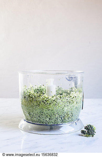 Shredded broccoli (broccoli rice) in a food processor