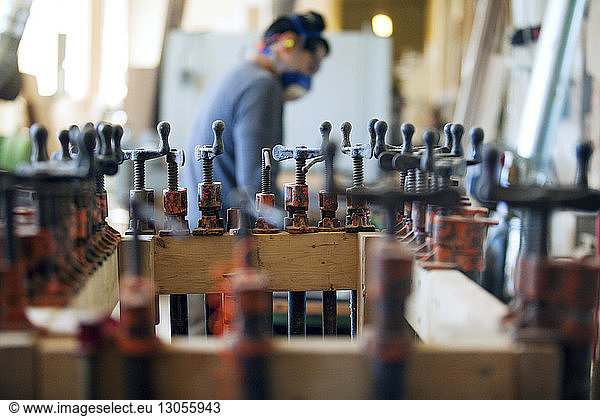Side view of male carpenter in workshop