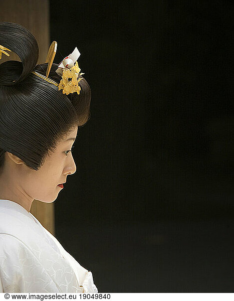 Side view portrait of a traditional Japanese bride.