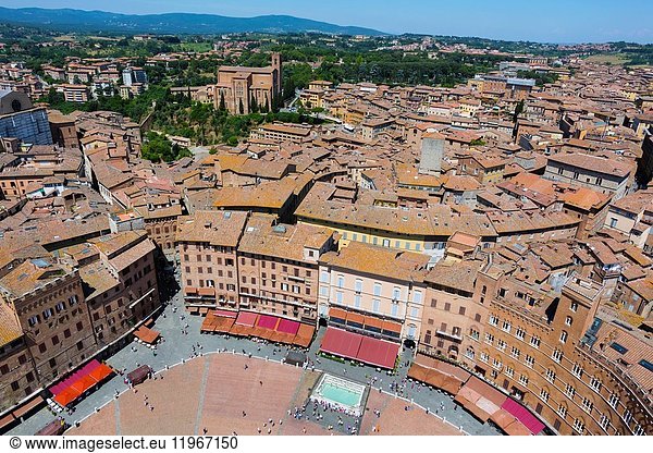 Siena,  Siena Province,  Tuscany,  Italy. Piazza del Campo seen from the top of the Torre del Mangia. The historic centre of Siena is a UNESCO World Heritage Site.