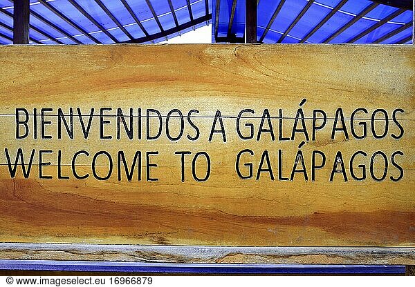 Sign at the ferry terminal Baltra  Welcome to Galapagos  Santa Cruz Island  Galapagos  Ecuador  South America
