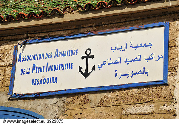 Sign on the building of the Union of Industrial fishers at the port of Essaouira  Morocco  Africa