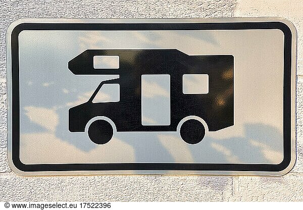 Sign with pictogram camper van on a wall  camper van pitch  Schleswig-Holstein  Germany  Europe