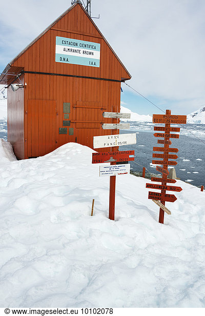 Signposts outside Brown Station along Paradise Harbor in the Antarctic.