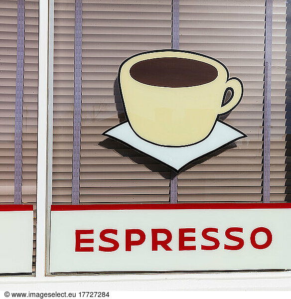 Signs for ESPRESSO  retro style sign on a cafe window.