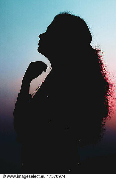 Silhouette of a girl on evening