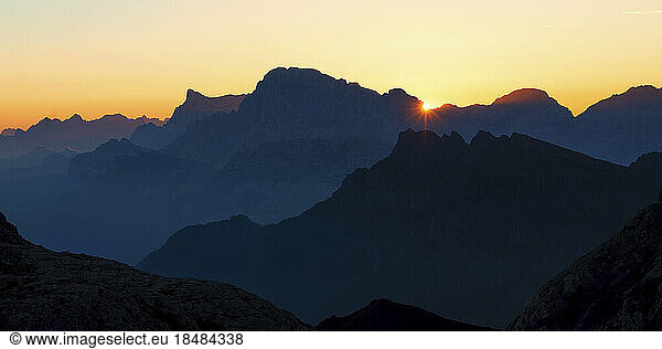 Silhouette of mountain ranges at sunrise  Dolomites  Italy