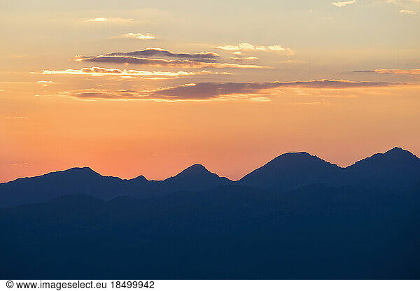 Silhouette of mountains in alpine landscape during sunrise  Zillertal  Tyrol  Austria