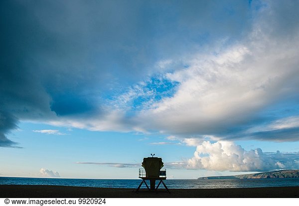 Silhouetted coastal watch tower  Maui  Hawaii