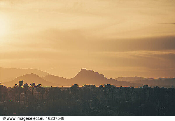 Silhouettes of mountains at sunset