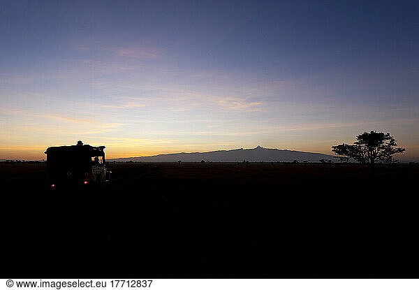 Silhoutte Of 4x4 At Dawn In Front Of Mt Kenya  Ol Pejeta Conservancy; Kenya