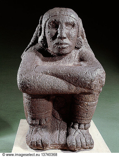 Sitzende Figur von Xochipilli  dem aztekischen Gott der Musik und des Tanzes. Musik und Tanz spielten eine wichtige Rolle in aztekischen Zeremonien. Mexiko. Azteke.