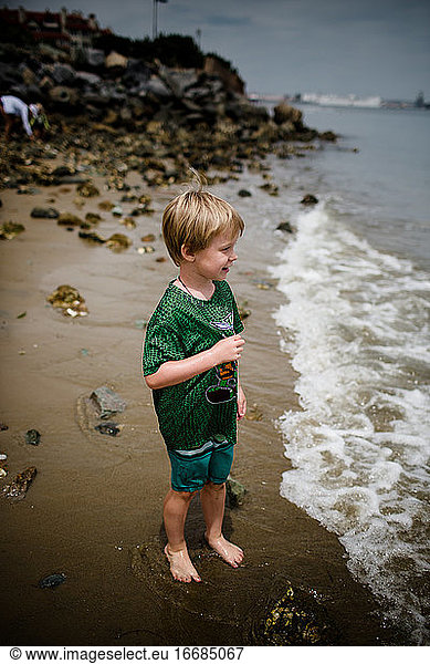 Six Year Old Boy Smiling & Looking into Coronado Bay