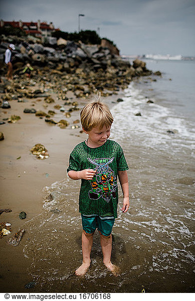 Six Year Old Boy Standing on Sand in Coronado Bay