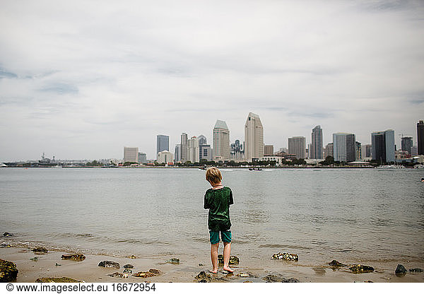 Six Year Old Standing on Beach in Coronado San Diego Skyline