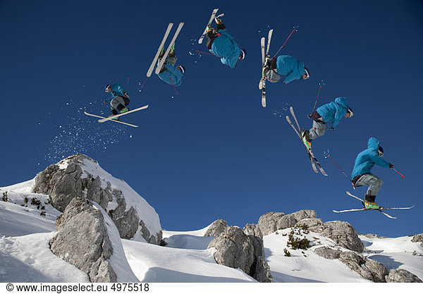 Skier doing dangerous free ride jump