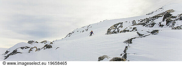 Skier in remote winter landscape  Coast Mountains  B.C.