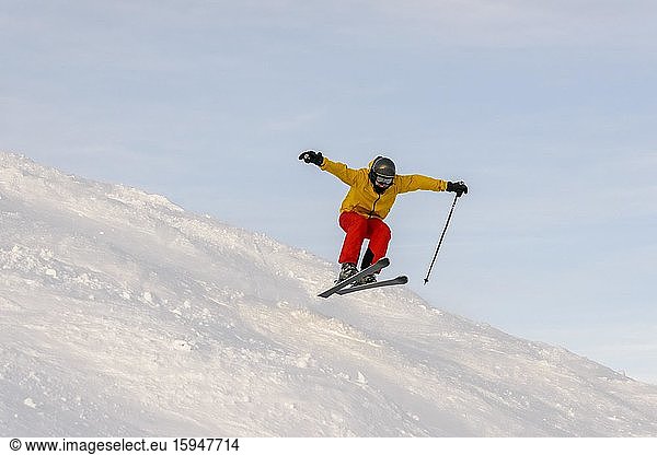 Skier jumping  downhill Hohe Salve  SkiWelt Wilder Kaiser Brixenthal  Hochbrixen  Tyrol  Austria  Europe